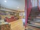 Living room features an open layout and stairs to the second level at 438 Las Casitas Way, Las Vegas, NV 89121