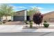 Charming single-story home showcasing a well-manicured front yard and a spacious two-car garage at 4505 Meline Ave, North Las Vegas, NV 89084