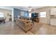 Spacious living room with tile flooring, comfortable seating, and abundant natural light at 4505 Meline Ave, North Las Vegas, NV 89084