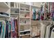 Organized walk-in closet featuring shelving and hanging storage for ample storage space at 4505 Meline Ave, North Las Vegas, NV 89084