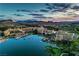 Stunning aerial shot of a lakeside resort featuring a marina and lush greenery, at twilight at 47 Strada Principale, Henderson, NV 89011