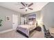 Bedroom featuring neutral carpet, modern furniture and a ceiling fan at 47 Strada Principale, Henderson, NV 89011