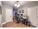 Bright office space featuring wood floors, dual monitors, and modern decor for an efficient work environment at 47 Strada Principale, Henderson, NV 89011