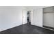Bedroom with gray flooring, closet, and door open to a view of the home at 4981 Alondra Dr, Las Vegas, NV 89118