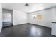 Open concept room features luxury vinyl plank flooring and a large window, perfect for entertaining guests at 4981 Alondra Dr, Las Vegas, NV 89118