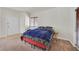 Comfortable bedroom showcasing carpeted floors, a double bed, and a private entrance at 5250 S Rainbow Blvd # 1144, Las Vegas, NV 89118