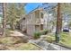 Attractive two-story condo building featuring a private balcony and nicely landscaped grounds at 5250 S Rainbow Blvd # 1144, Las Vegas, NV 89118