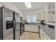 Well-appointed kitchen with stainless steel appliances, granite counters, and functional layout at 5250 S Rainbow Blvd # 1144, Las Vegas, NV 89118