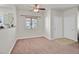 Well-lit living area with neutral walls and carpet, providing a comfortable living space at 5250 S Rainbow Blvd # 1144, Las Vegas, NV 89118