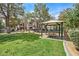 Community park area with picnic benches and shade, perfect for outdoor relaxation and social gatherings at 5250 S Rainbow Blvd # 1144, Las Vegas, NV 89118