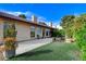 Large backyard has an extended patio, lawn area and mature landscaping at 5541 Port Barrington Way, Las Vegas, NV 89130