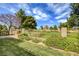Scenic backyard view overlooking a golf course with lush green grass and mature landscaping at 5541 Port Barrington Way, Las Vegas, NV 89130