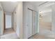 Hallway featuring carpet, a closet, and access to other rooms in the home at 5541 Port Barrington Way, Las Vegas, NV 89130