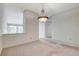Neutral living room with bright light and neutral walls at 5541 Port Barrington Way, Las Vegas, NV 89130