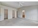 The main bedroom has vaulted ceilings, a ceiling fan, two closets, and a bathroom at 5541 Port Barrington Way, Las Vegas, NV 89130