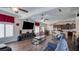Expansive living room with stylish decor, large television, and open concept layout at 5820 Amber Station Ave, Las Vegas, NV 89131