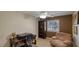 A cozy office featuring a desk, shelves, and comfortable chair, perfect for working from home at 5820 Amber Station Ave, Las Vegas, NV 89131
