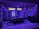 Cozy covered patio with stylish outdoor dining set and string lights at 5820 Amber Station Ave, Las Vegas, NV 89131