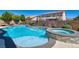 Backyard oasis showcasing a private pool and spa surrounded by lush landscaping at 5820 Amber Station Ave, Las Vegas, NV 89131