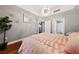 Cozy bedroom with stylish decor, light gray walls, and wood flooring at 59 E Agate Ave # 306, Las Vegas, NV 89123
