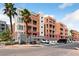 Beautiful view of complex exterior highlighting architectural details, balconies, and parking at 59 E Agate Ave # 306, Las Vegas, NV 89123