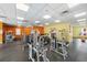 Community gym featuring modern workout equipment and bright yellow and orange walls at 59 E Agate Ave # 306, Las Vegas, NV 89123