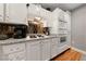 Modern kitchen featuring stainless steel appliances and custom cabinets at 59 E Agate Ave # 306, Las Vegas, NV 89123