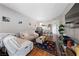 Bright living room featuring modern decor and updated kitchen at 59 E Agate Ave # 306, Las Vegas, NV 89123