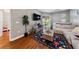 Bright living room featuring modern decor and balcony access at 59 E Agate Ave # 306, Las Vegas, NV 89123