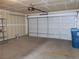 Spacious two-car garage with automatic door and ample storage space for vehicles and other belongings at 5912 Wabusca Way, Las Vegas, NV 89142