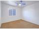 Spare bedroom featuring carpet floors, one window, and a ceiling fan at 5929 Sleepy Fawn Dr, Las Vegas, NV 89142