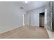 This is a cozy bedroom featuring neutral carpeting and a closet with sliding doors at 6116 Tokara Ave, Las Vegas, NV 89122
