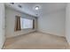 Bright bedroom featuring neutral walls, carpet flooring and window with blinds at 6116 Tokara Ave, Las Vegas, NV 89122