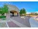 Inviting clubhouse featuring stone accents and well-manicured landscaping at 6116 Tokara Ave, Las Vegas, NV 89122