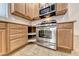 Kitchen with stainless steel gas range and lazy susan at 6116 Tokara Ave, Las Vegas, NV 89122