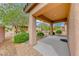 This home features a shaded patio area ideal for relaxing with beautifully landscaped surroundings at 6116 Tokara Ave, Las Vegas, NV 89122