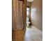 Functional full bath with a shower-tub combo, neutral color scheme, and tile floor offering practicality at 6495 Chettle House Ln, Las Vegas, NV 89122