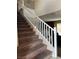 Open entryway to the home featuring stairs with plush carpet and an open floorplan at 6495 Chettle House Ln, Las Vegas, NV 89122