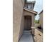 The front door entrance shows an arched entryway and traditional door style at 6495 Chettle House Ln, Las Vegas, NV 89122
