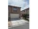 Charming two-story home with a two car garage and well-manicured landscaping at 6495 Chettle House Ln, Las Vegas, NV 89122
