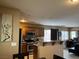 Well-equipped kitchen features wood cabinets, stainless steel appliances, and granite countertops at 6495 Chettle House Ln, Las Vegas, NV 89122