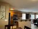 Well-equipped kitchen features wood cabinets, stainless steel appliances, and granite countertops at 6495 Chettle House Ln, Las Vegas, NV 89122