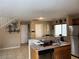 Kitchen featuring stainless steel appliances and breakfast bar at 6495 Chettle House Ln, Las Vegas, NV 89122