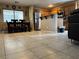Open-concept kitchen and dining area featuring natural light and stainless steel appliances at 6495 Chettle House Ln, Las Vegas, NV 89122