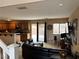 Spacious living room connected to the kitchen and patio at 6495 Chettle House Ln, Las Vegas, NV 89122