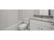 Bright bathroom boasts tiled walls and tub surround, with a neutral vanity at 6760 Violet Cascade Ave, Las Vegas, NV 89156