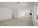 Bright, open floor plan with light wood flooring and fresh white walls; a modern and inviting space at 6760 Violet Cascade Ave, Las Vegas, NV 89156