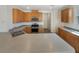 Well-equipped kitchen with modern appliances, ample counter space, and attractive cabinetry at 7011 Overton St, Las Vegas, NV 89166