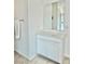 Bathroom vanity with white countertop and white cabinets at 7041 Fossil Rim St, North Las Vegas, NV 89084