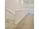 Upstairs hallway featuring neutral walls and carpet, offering a serene transition between living spaces at 7041 Fossil Rim St, North Las Vegas, NV 89084